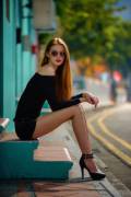 Long, Leggy Redhead Chillin' on Front Steps