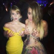 Melissa Rauch and Kaley Cuoco grabbing their tits