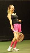 Kaley Cuoco playing tennis