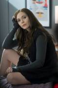 Imagine Elizabeth Olsen sitting beside you as she strokes your erection