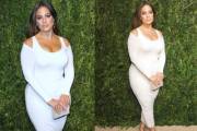 Ashley Graham's dress hugs her voluptuous body.