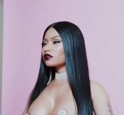 Nicki Minaj's creases in motion, while topless