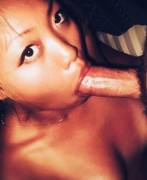 Asian slut loves sucking white cock for the camera