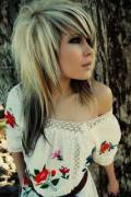 Beautiful blonde scene girl outside