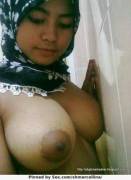 Young Indonesian hijab girl with big tits