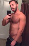 Poking his tongue out