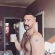 Enjoying his coffee