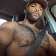 Shirtless driver