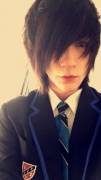 Cute emo boy in an school uniform