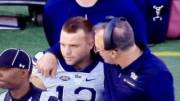 Pittsburg coach gives player a peck on the cheek after he misses a PAT. That's one lucky player!