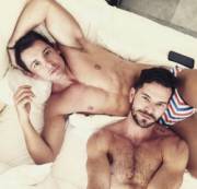 In bed together