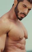 Bulgarian singer Fikret Tuncher Fikret ('Fiki')'s wet pecs