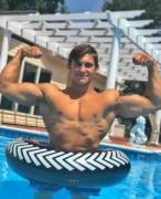 Flexing in the pool (X-Post /r/malebiceps)