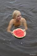Blondie jumped with her watermelon into the lake before stronger wild women steal it from her, she looks so happy