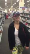 Cute Blonde Flashing In A Store