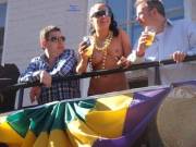 Topless on a balcony for all to see