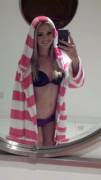 Cute blonde girl in towel robe