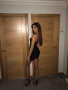 Brunette in black dress and heels