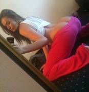 Tori Black in pink sweats pulled half down