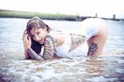 Kristina Labahn - Wet and loving it. [x-post /r/hotchickswithtattoos]