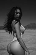 hottie shows off her perfect ass in a thonged bodysuit