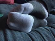 Peeling off stinky socks 