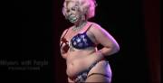 Dirty Martini: vulgar patriotic stripper with a magic ass.