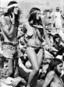 Hippie couple taking it easy at Woodstock, 1969