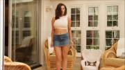 Joey Fisher in a denim skirt