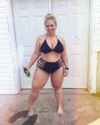 Chubby bikini gal having a beer