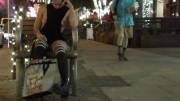 Both boobs out as I chill on a busy street! [GIF]