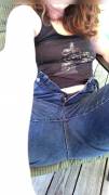 Outside on the deck, fully clothed.