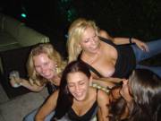 Happy girls laughing with a delightful nip slip