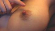Teasing her nipple