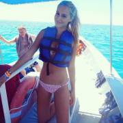 A lovely on a boat. via /r/NSFWPonytails