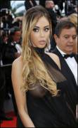 Nabilla Benattia in a see through dress