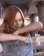 A cute redhead flashing her tits in public