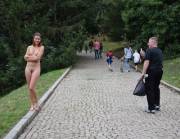 Elise naked and smiling on a path somewhere in Eastern Europe.....