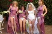 Sexy bride with her naughty bridesmaids