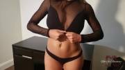 Revealing her pierced tits