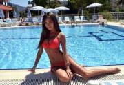Sunning herself by the pool