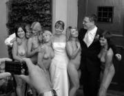 The happy couple, and a couple of nude bridesmaids