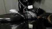 Plastic bondage and breath control in latex