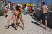 Two Friends Playing in Public