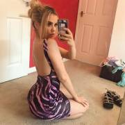 Meg shows off her lovely arse in minidress