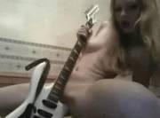 Blonde fucking a white guitar