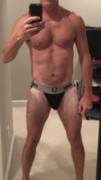 Exposing strapped muscle dad. black Bike jockstrap