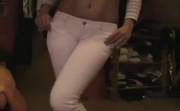 Wetting her white pants