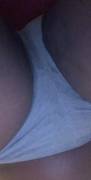 Pissing in her panties with the camera upside down