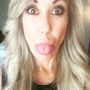 Brandi Love Tongue Out